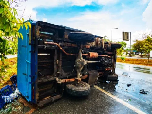 road accident caused by a spill on the road - risk of slipping
